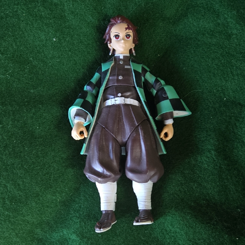 Green & Black Checkered Kids Action Figure with Brown Outfit